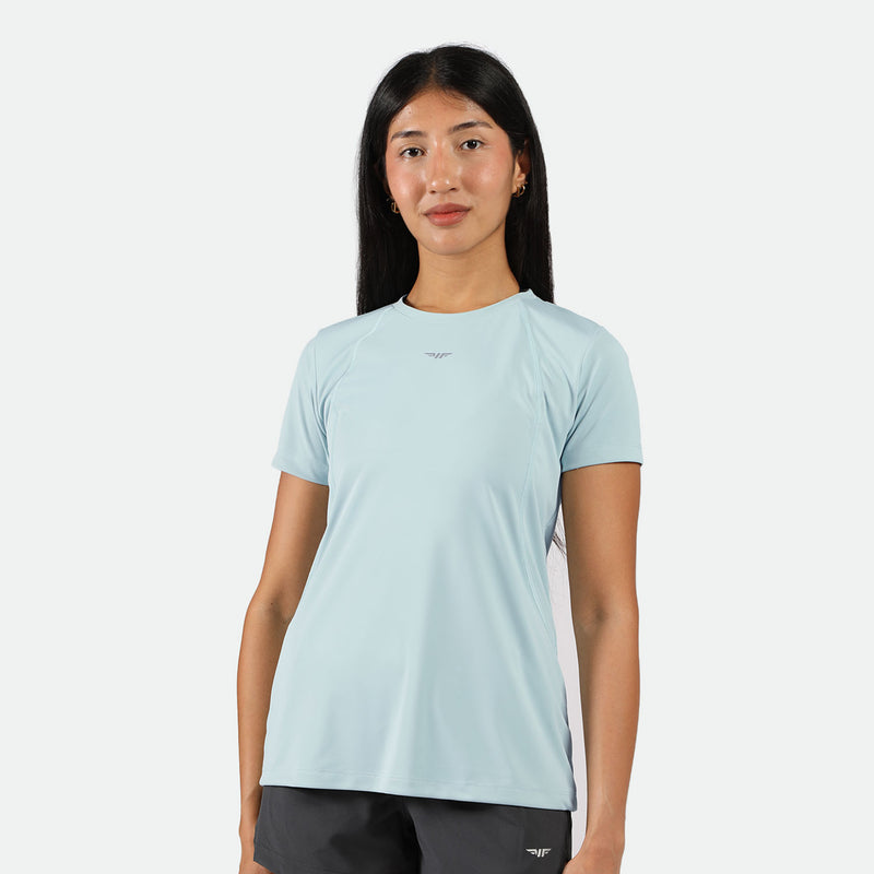 a fit woman wearing t-shirt sky blue with logo ,and she wearing short black with logo 