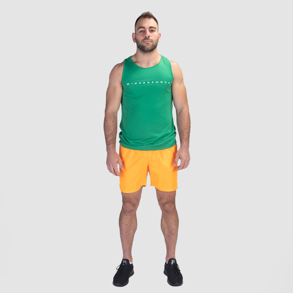 a fit man wearing tank spring green with short yellow, plus shoes black 