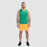 a fit man wearing tank spring green with short yellow, plus shoes black 