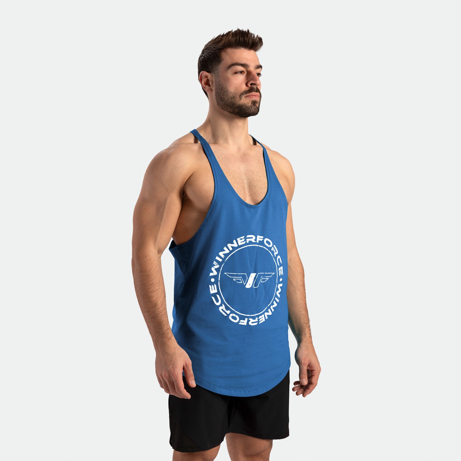 a fit man wearing tank blue and short black 