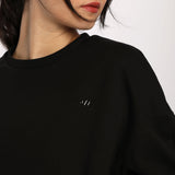 close up view for fit woman wearing sweatshirt black with logo 