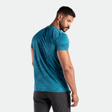 a back view for fit men wearing t-shirt camo Saxony blue with pants grey 