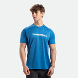 a fit man wearing t-shirt camo azure blue with logo and pants black 