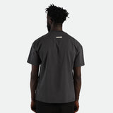 a back view for man wearing t-shirt dark grey with logo ,plus short black 