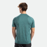 a back view for fit man wearing camo t-shirt DARK-CYAN with pants black 