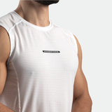 close up view for fit man wearing tank white with logo in half 