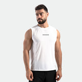 a fit man wearing tank white with logo in half and pants black 
