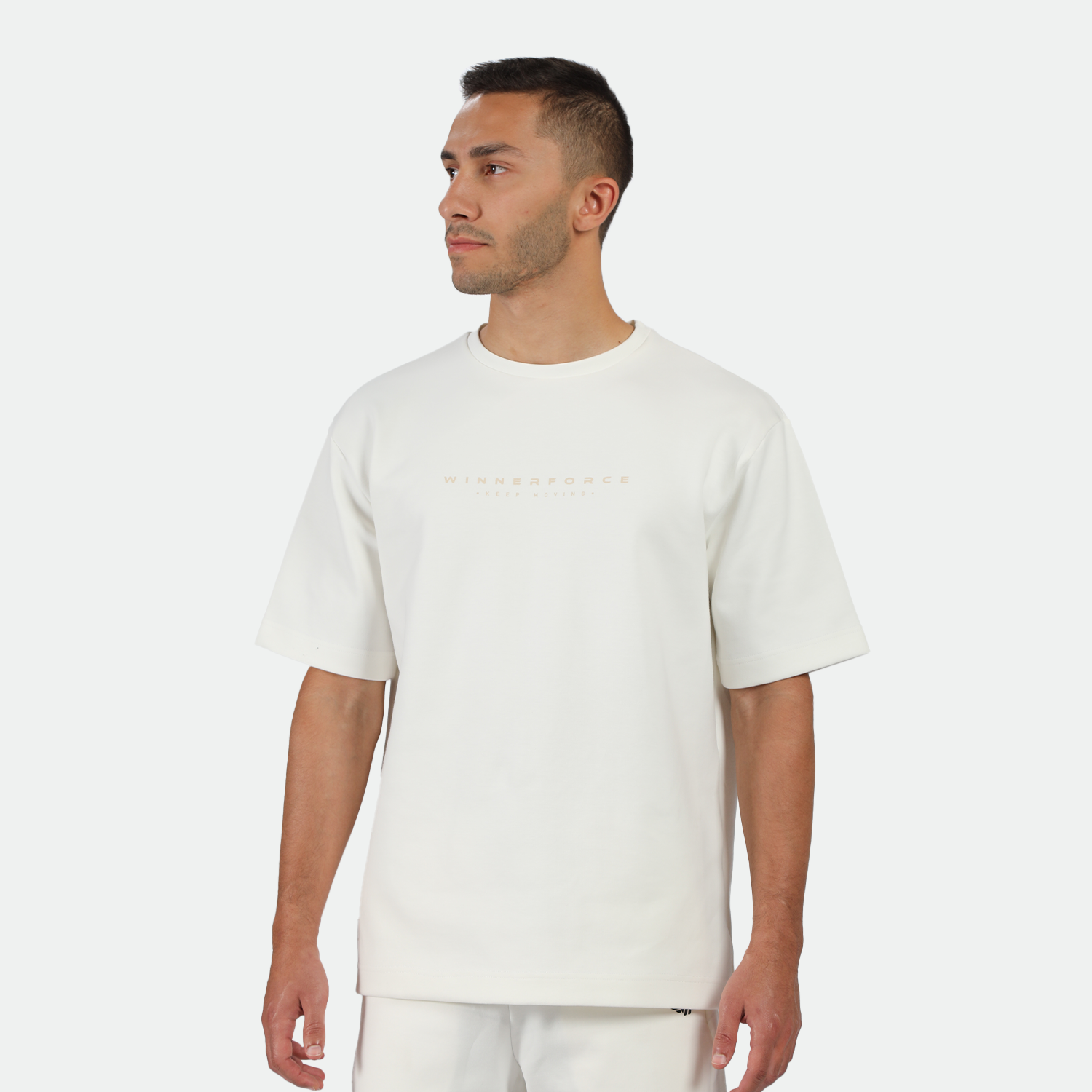 a fit man wearing matching set off white  ,t-shirt and short 