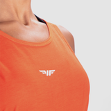 close up view for fit woman wearing  tank orange with logo white 