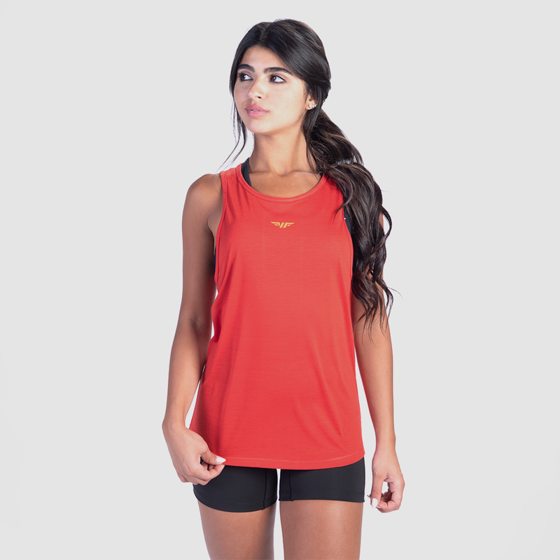 a fit woman wearing tank red with short black 