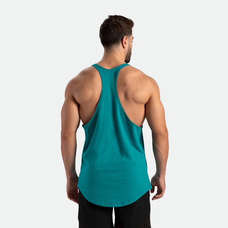 a back view for man wearing tank tile blue with short blue 