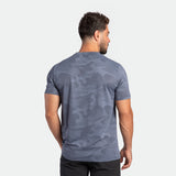 a back view for fit man wearing  camo t-shirt VINTAGE-INDIGO with pants black 