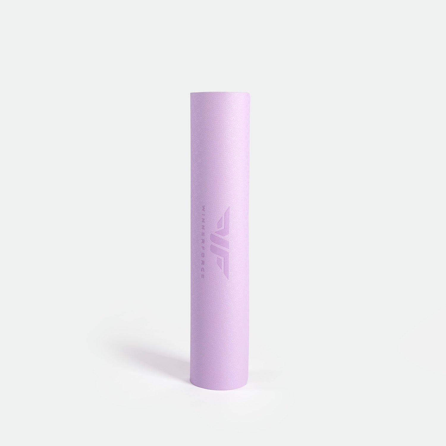 A rolled-up lavender yoga mat on a white background. The mat has a smooth texture with a subtle, embossed logo near the center, conveying calmness and simplicity.