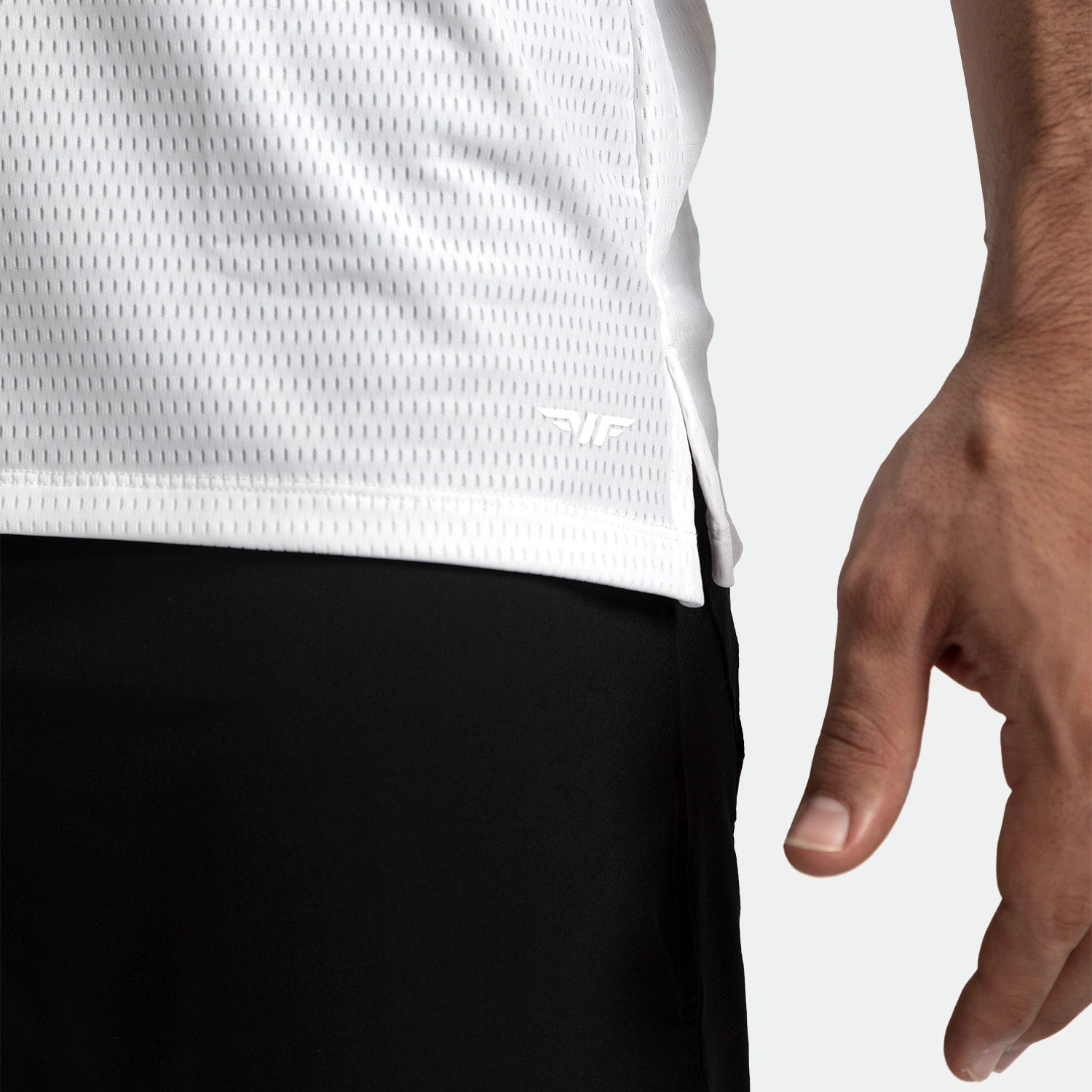 close up view for man wearing tank white with pants black