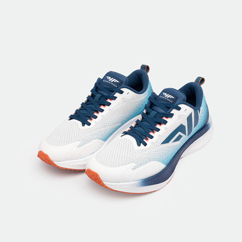 Stylish white athletic shoes with blue accents, orange soles, and navy laces. Minimalist design, suggesting a modern, sporty aesthetic.