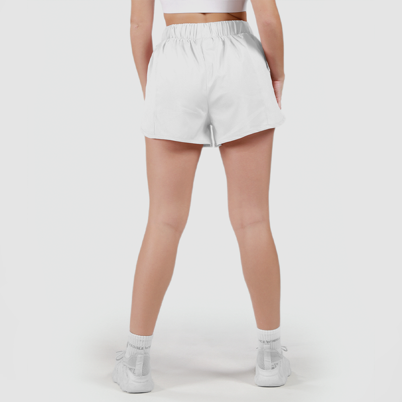 a back view for fit woman wearing short white 2 in 1 with shoes white ,plus the background is light grey 
