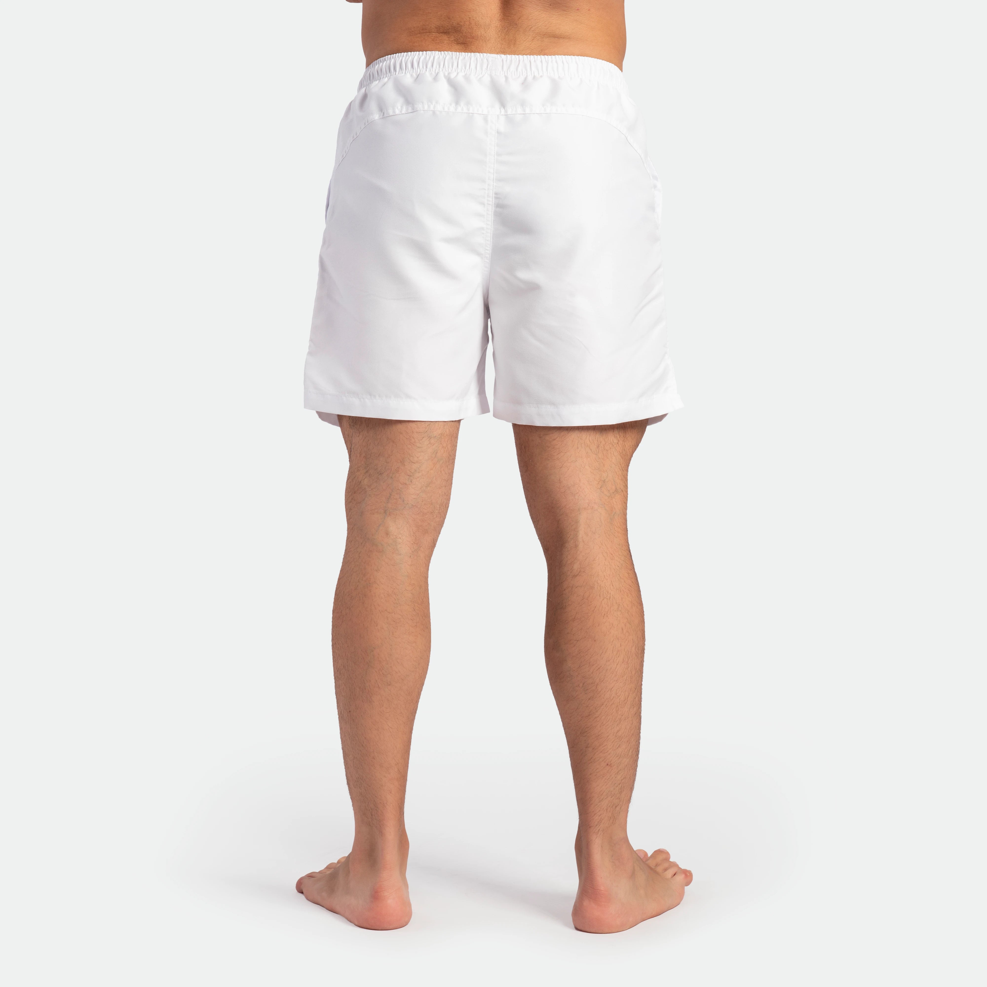 a back view for fit man wearing short white 