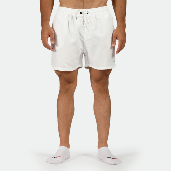 a fit man wearing short white with socks 