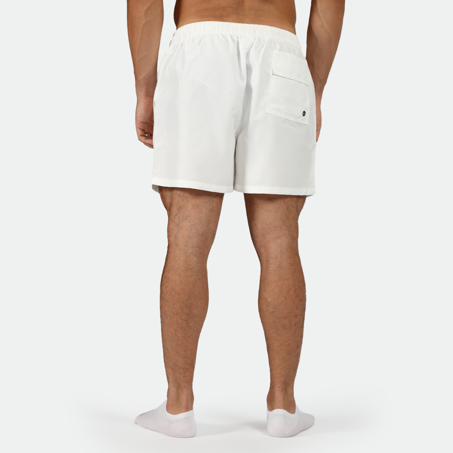 a back view for  man wearing short white  with socks white 