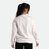 A young woman with a ponytail wearing a white sweatshirt, facing away from the camera, showcasing the back of the garment.
