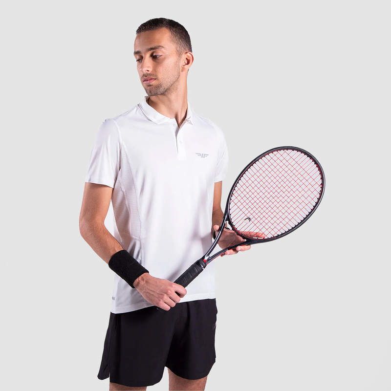 Athletic man wearing a white polo t-shirt and black shorts, holding a tennis racket, ready to play. The outfit features a sporty and stylish design, ideal for tennis or activewear