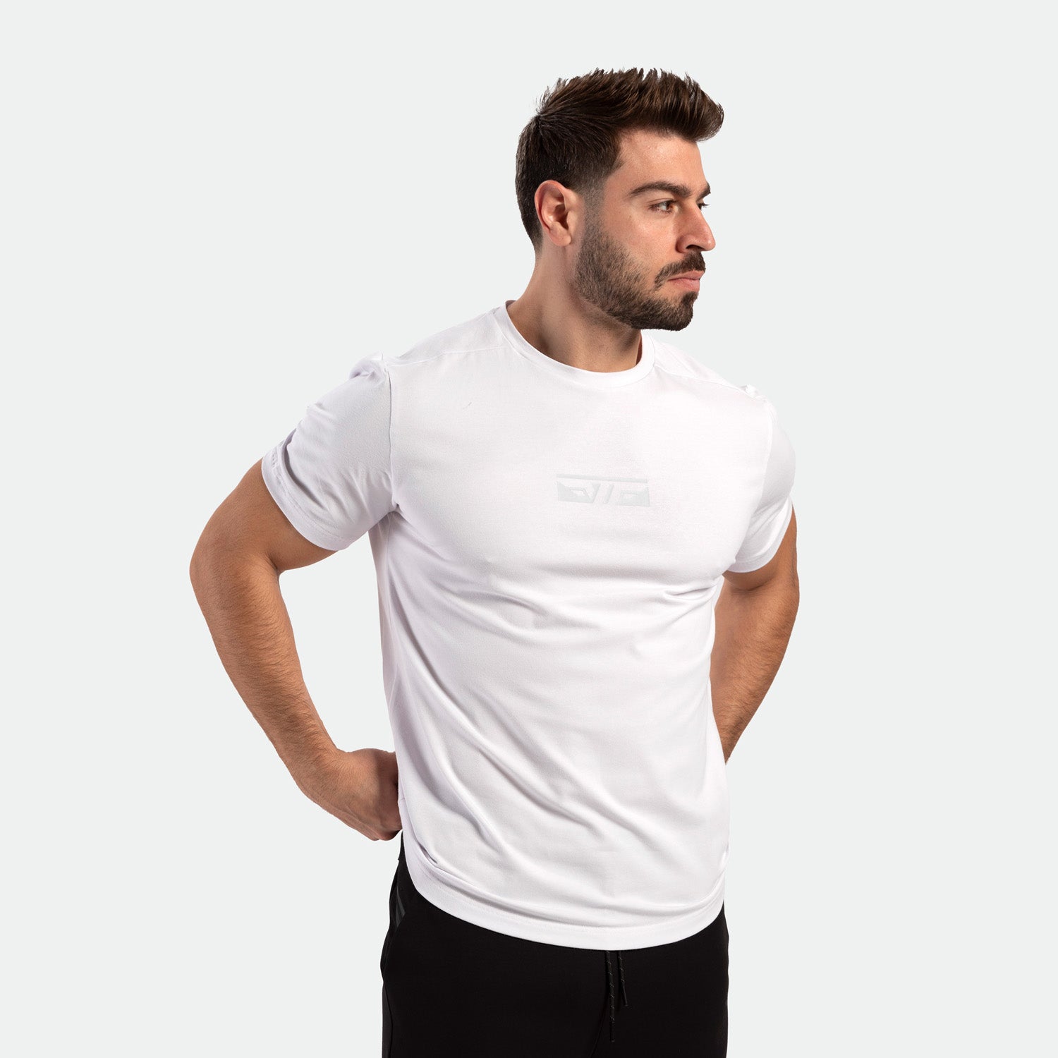 a fit man wearing t-shirt white with pants black 