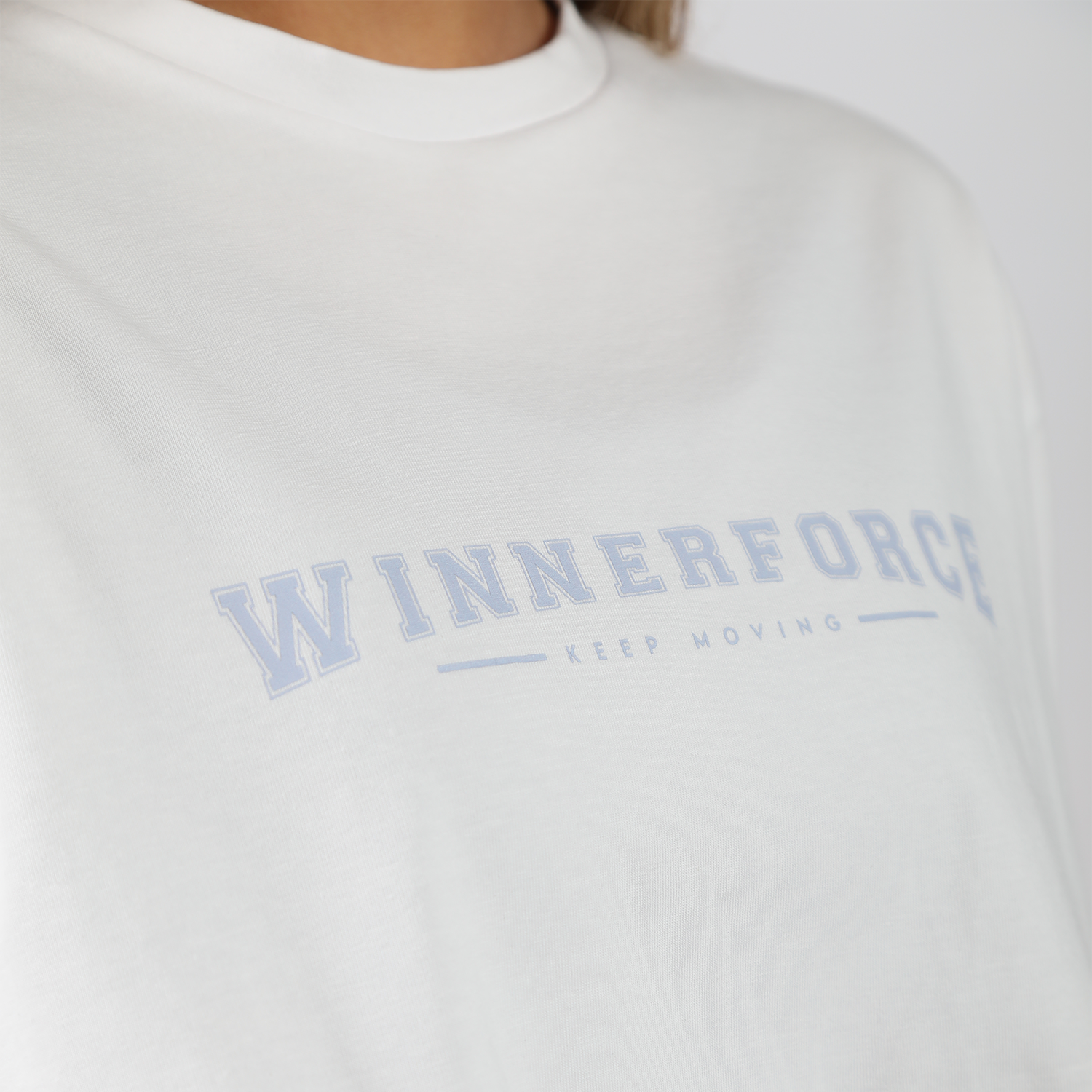 close up view for fit woman wearing t-shirt white with logo