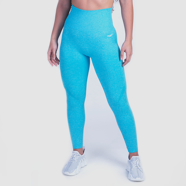 a fit woman wearing legging blue  with logo white, and she wearing shoes white ,plus the background is light grey 