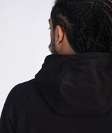 The crossover neckline into a three-piece drawcord hood not only adds a unique touch, but also ensures warmth and comfort. 