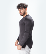 a fit man wearing sleeve t-shirt grey with pants white 