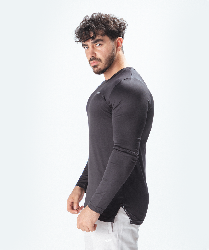 a fit man wearing sleeve t-shirt grey with pants white 