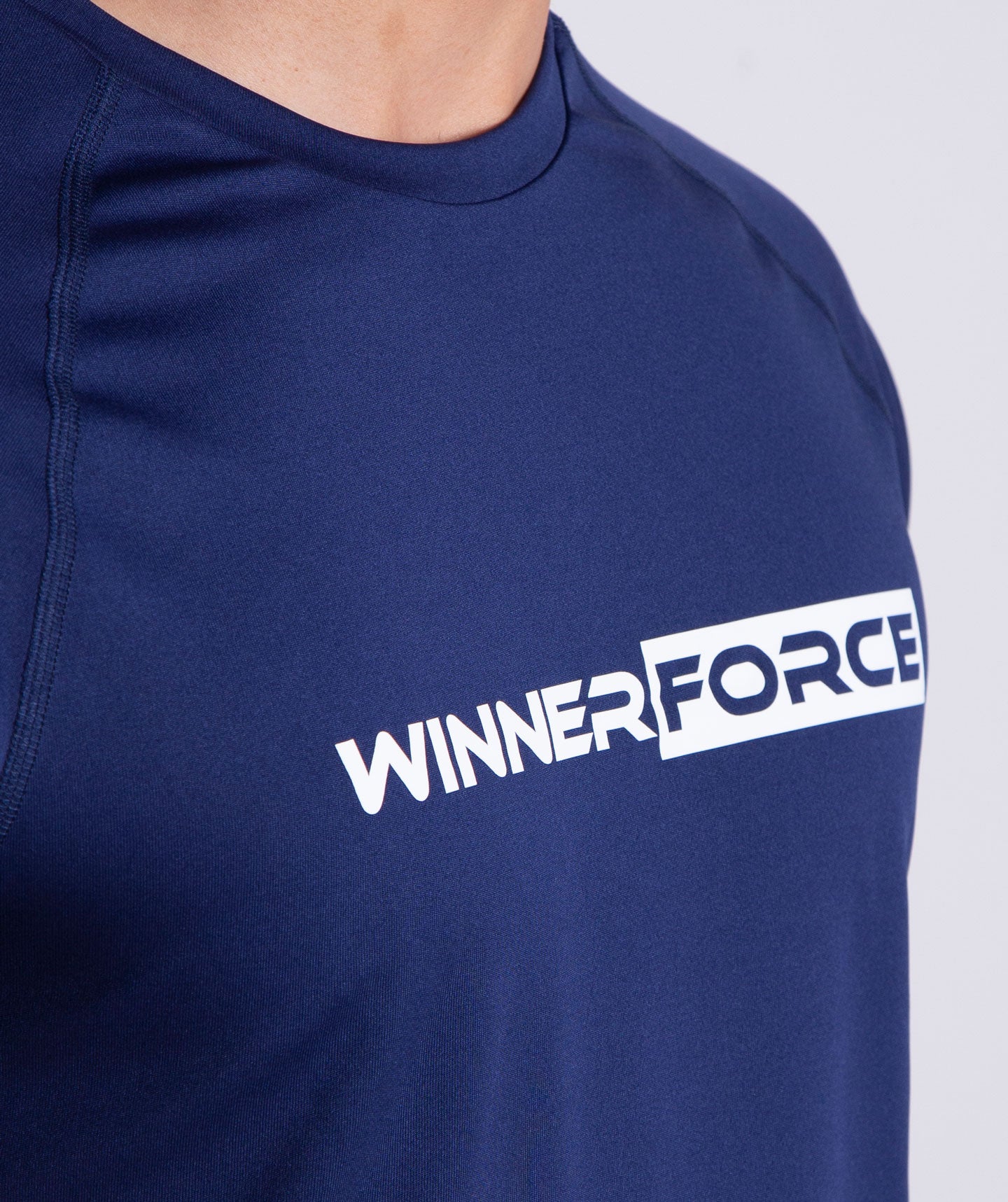 close up view for fit man wearing t-shirt navy blue